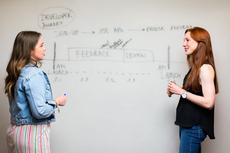 Teacher Engaging with Students in Classroom