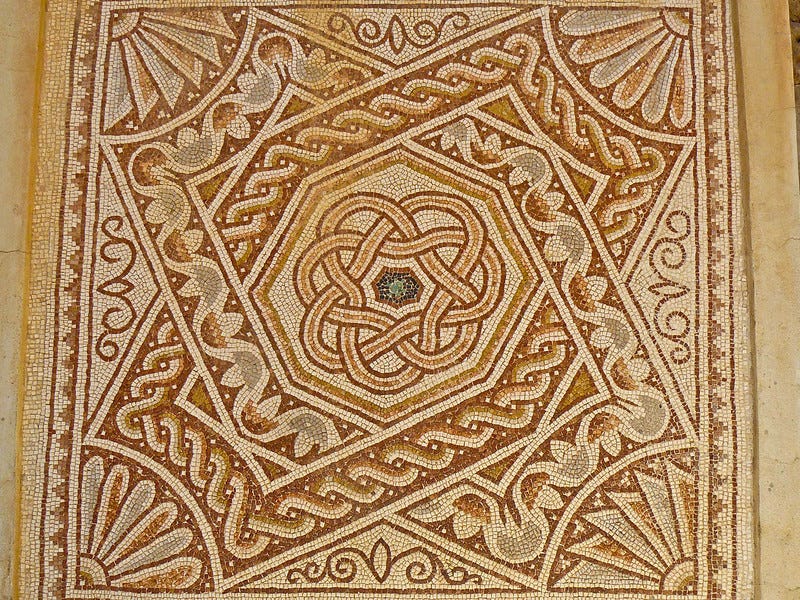 Roman mosaic showcasing intricate knot designs