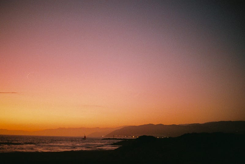 Dusty sunset over a field