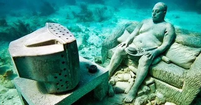 Underwater sculptures blending art with nature.