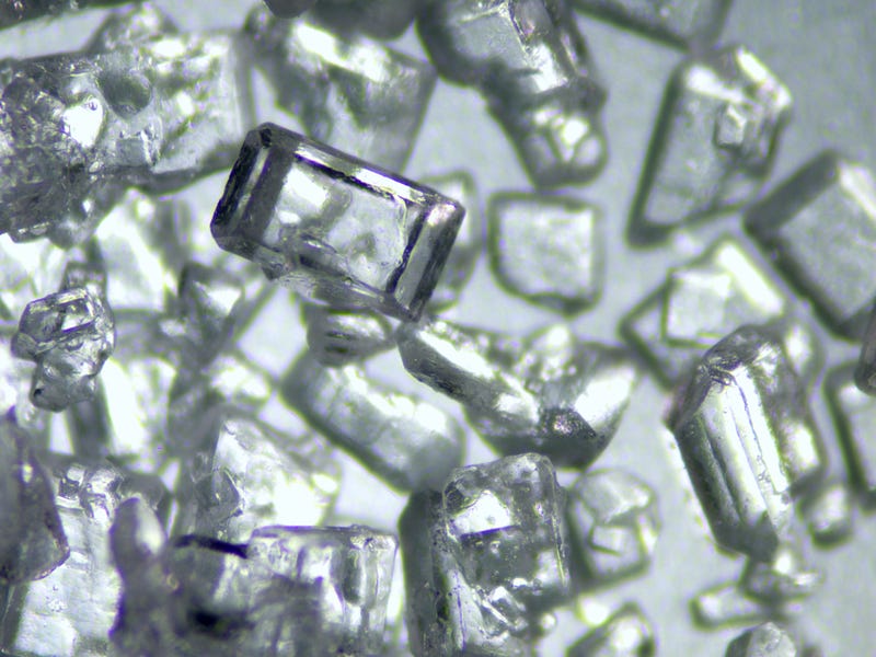 Close-up view of sugar crystals showcasing their cubic structure