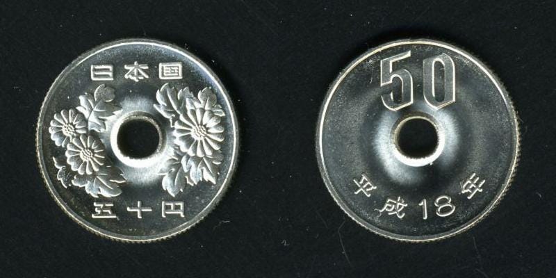 Japanese 50 yen coin made of copper and nickel